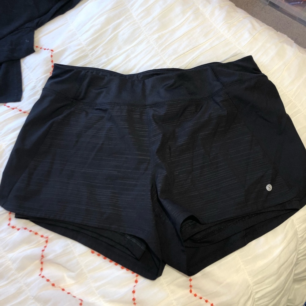 Black running shorts